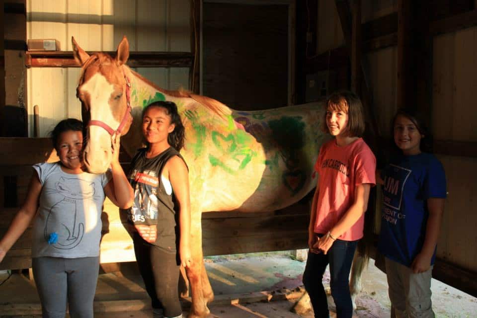 Campers with horse at WeHaKee Camp for Girls