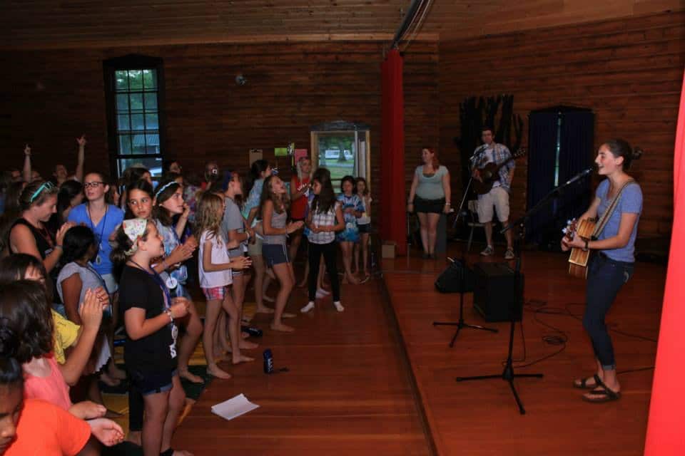 singing at camp with everyone