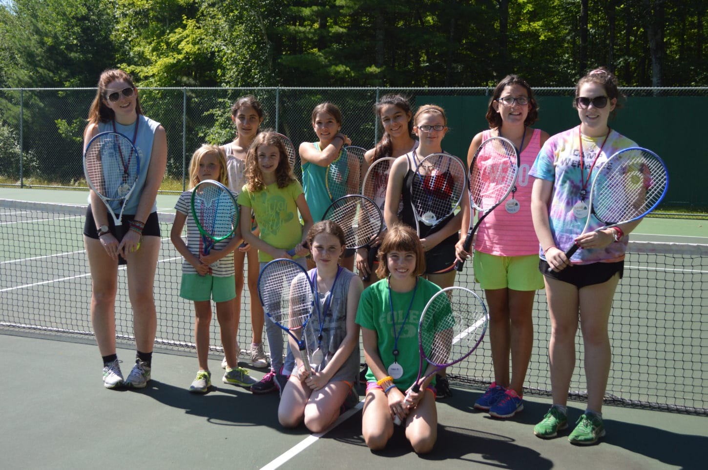 Camper tennis players at WeHaKee Camp for Girls.