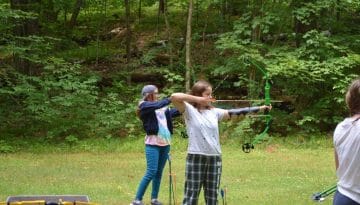 Campers practicing their archery skills at WeHaKee Camp for Girls.