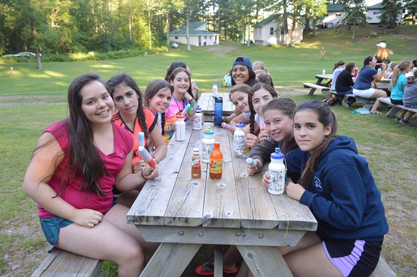 WeHaKee Camp for Girls campers enjoying popsicles.