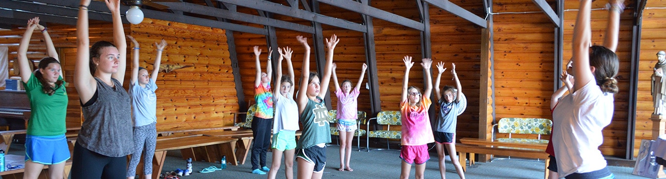 WeHaKee Camp for Girls Campers stretching.