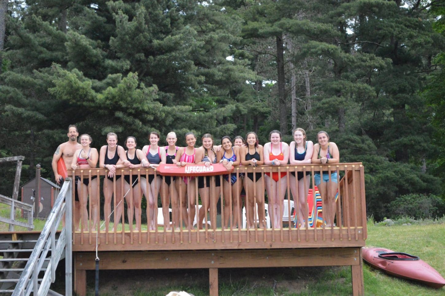 WeHaKee Camp for Girls group photo of lifeguard staff in swim gear.