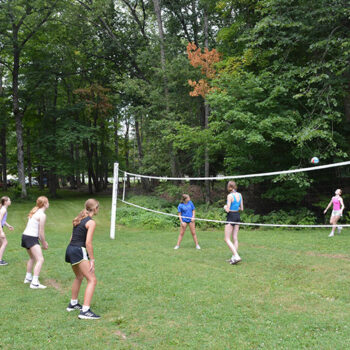 Playing soccer at WeHaKee Camp for Girls